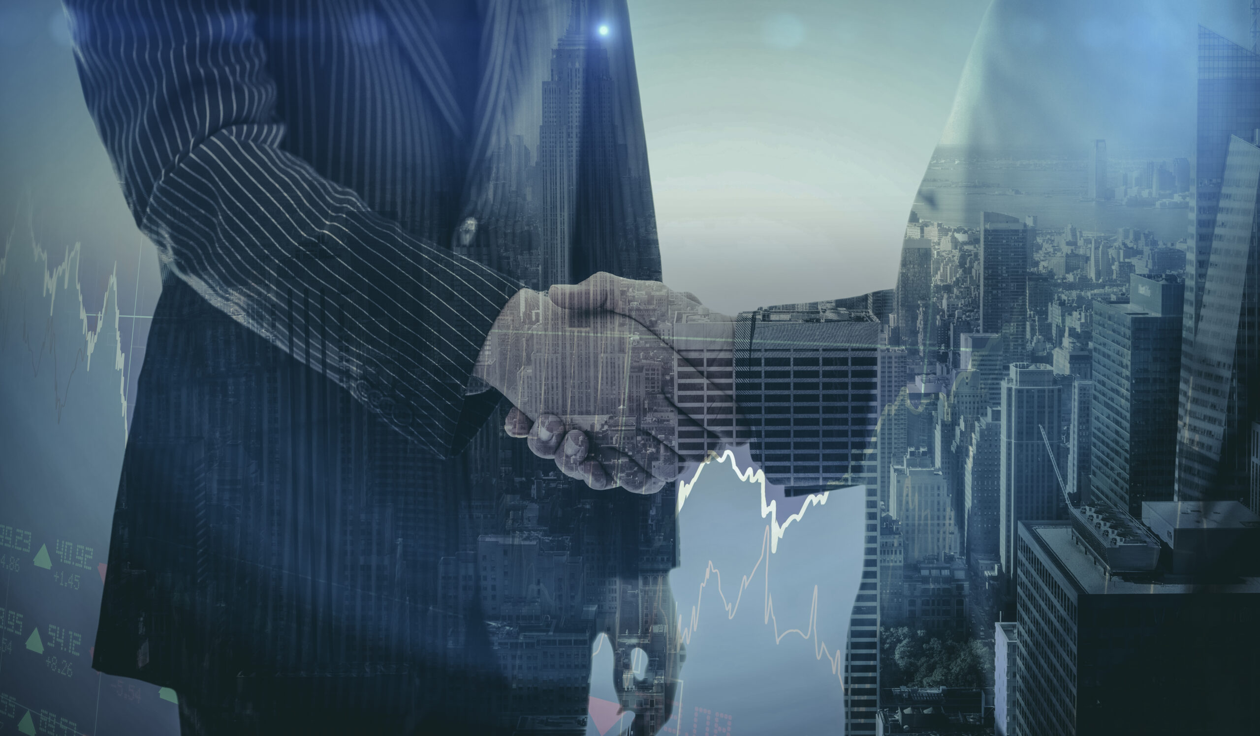 Stocks and shares against composite image of business people shaking hands Stocks and shares against composite image of business people shaking hands